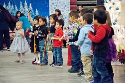 Head Start children sing at the Elder's Christmas Party.